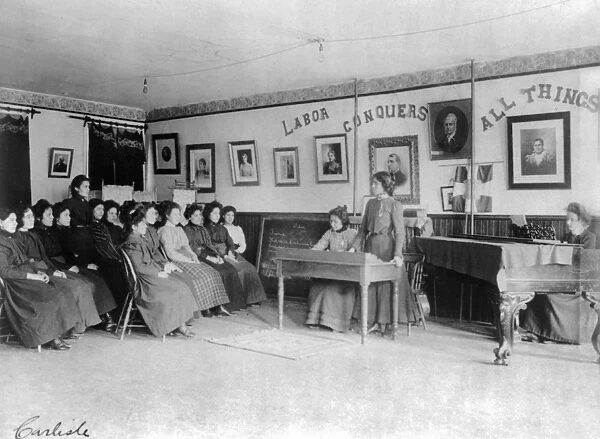 CARLISLE SCHOOL, c1901. Debating class at the Carlisle Indian School in Carlisle, Pennsylvania