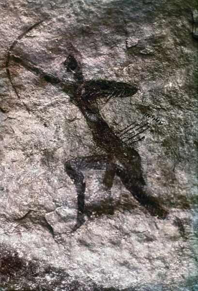 CAVE ART, ALGERIA. An archer. Rock painting from Tassili-des-Ajjer, Algeria