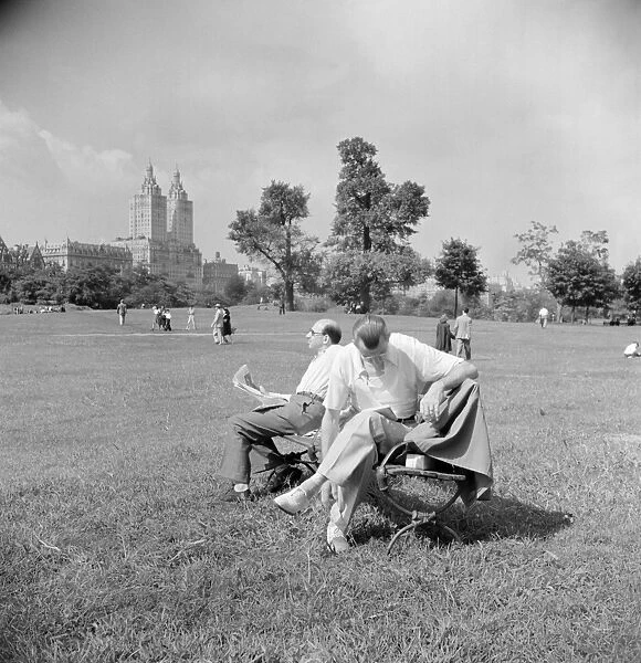 CENTRAL PARK, 1942. Men relaxing in Central Park on a Sunday, New York