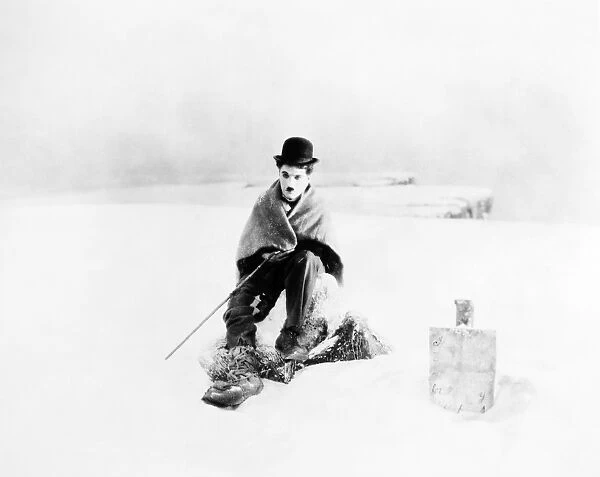 CHAPLIN: GOLD RUSH, 1925. Charlie Chaplin in a scene from the film, The Gold Rush, 1925
