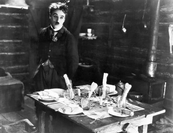 CHAPLIN: THE GOLD RUSH, 1925. Charlie Chaplin in a scene from the film, The Gold Rush, 1925