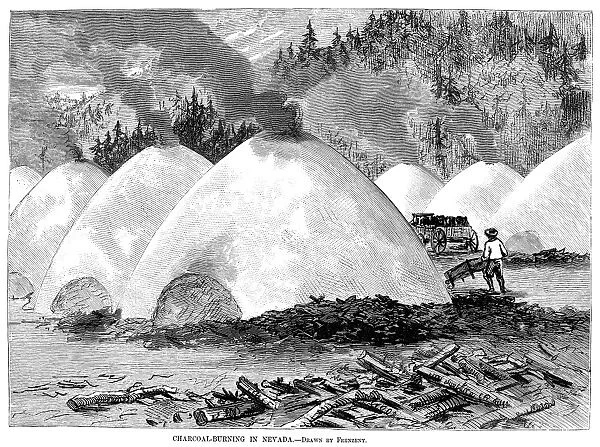 CHARCOAL KILN, 1877. Burning wood to make charcoal, in Nevada. Wood engraving, American