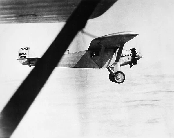 CHARLES A. LINDBERGH (1902-1974). American aviator. Lindbergh flying The Spirit of St