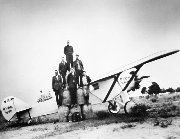 CHARLES A. LINDBERGH (1902-1974). American aviator. Lindbergh (bottom center of pyramid)
