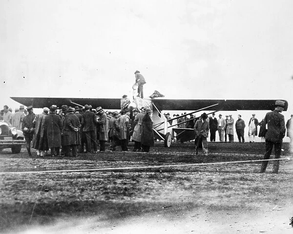 CHARLES A. LINDBERGH (1902-1974). American aviator. The last moments of fueling the Spirit of St
