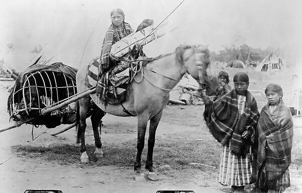CHEYENNE FAMILY, 1889. The family of Stump Horn, a Northern Cheyenne scout: A girl
