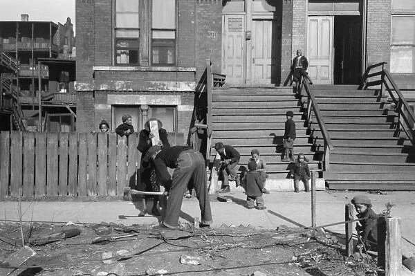CHICAGO: APARTMENTS, 1941. Residents outside of an apartment building on the South