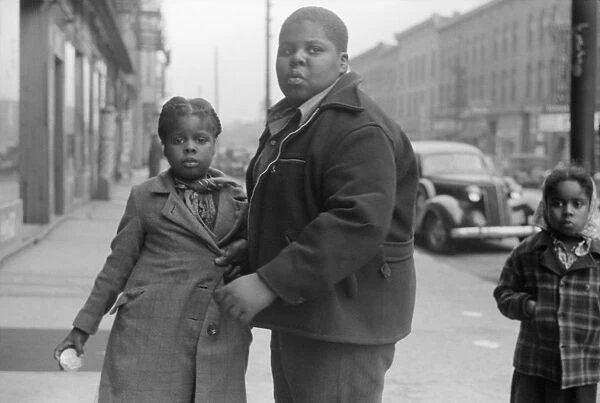CHICAGO: CHILDREN, 1941. African American children on a street in Chicago, Illinois