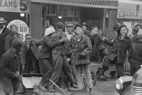 CHICAGO: CHILDREN, 1941. African American boys goofing off in Chicago, Illinois