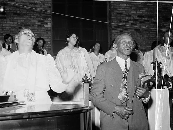 CHICAGO: CHURCH, 1941. Singing at an African American Pentecostal church in Chicago, Illinois