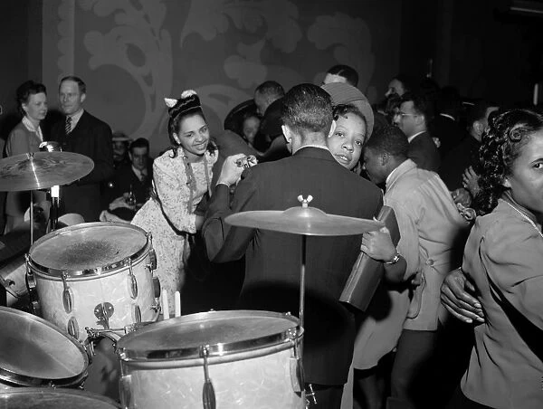 CHICAGO: DANCING, 1942. Men and women dancing to the music of Red Sounders