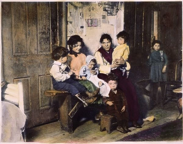 CHICAGO: IMMIGRANTS. An Italian immigrant family in their Chicago home. Oil over a photograph
