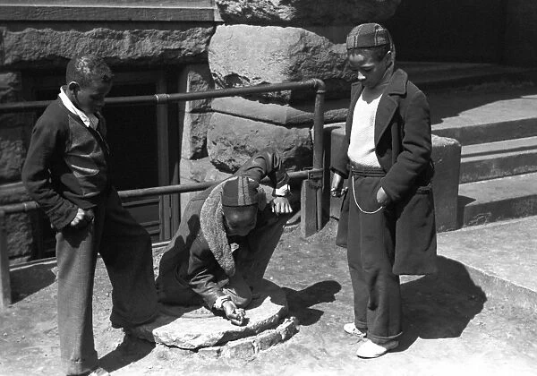 CHICAGO: MARBLES, 1941. Boys playing a game of marbles on the South Side of Chicago, Illinois
