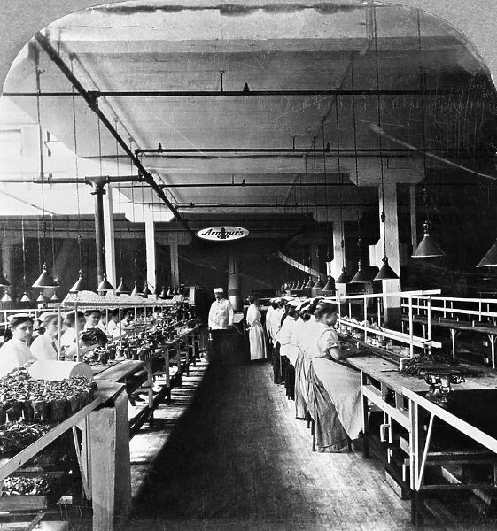 CHICAGO: MEATPACKING. Factory workers packing sliced bacon in glass jars at the Armour