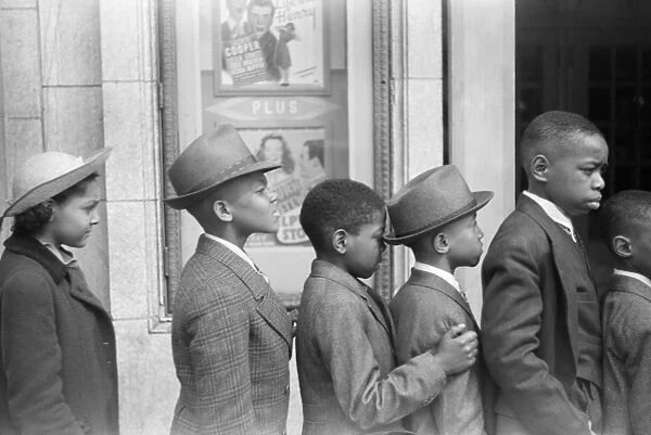 CHICAGO: MOVIE THEATER. Children lined up to see the Easter Sunday matinee at a