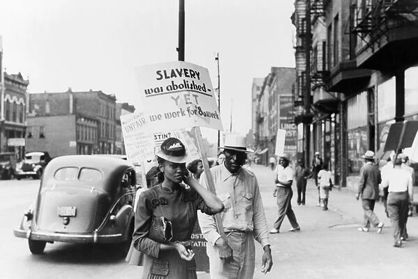 CHICAGO: PROTEST, 1941. A picket line protesting low wages for African Americans