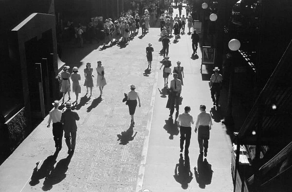 CHICAGO: RUSH HOUR, 1941. A crowded street at 5 o clock in the afternoon in Chicago, Illinois