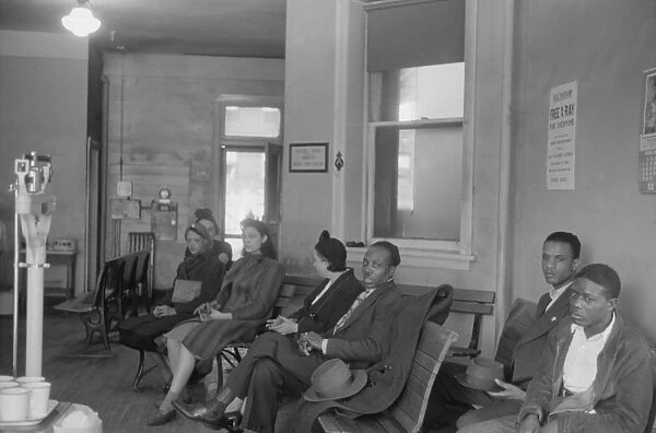 CHICAGO: SANITARIUM, 1941. Men and women in the waiting room at the municipal sanitarium