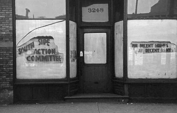 CHICAGO: SOUTH SIDE, 1941. Signs in the windows of the South Side Action Committee in Chicago