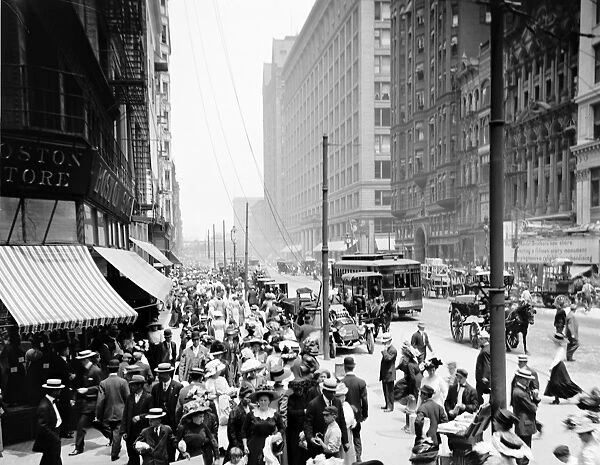 CHICAGO: STATE STREET, c1915. A busy crowd on State Street, looking north from Madison Street