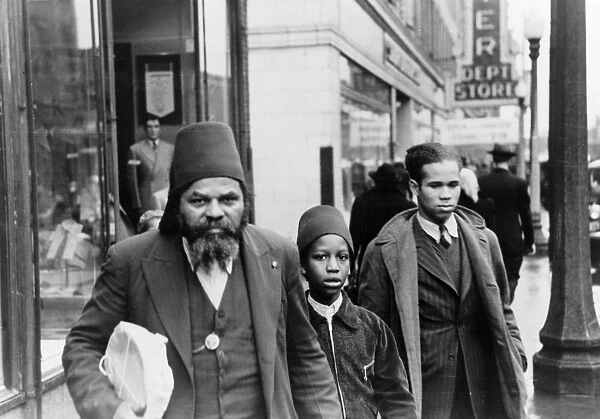 CHICAGO: STREET, 1941. Group in religious attire on a Chicago street. Photograph by Russell Lee