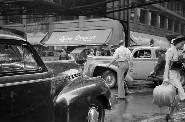 CHICAGO: TRAFFIC, 1941. Jaywalkers in traffic in Chicago, Illinois. Photograph by John Vachon
