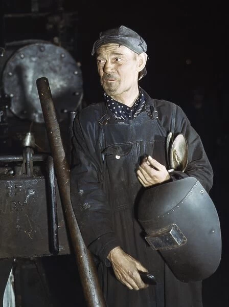 CHICAGO: WELDER, 1942. A welder at the Chicago and North Western Railway Company