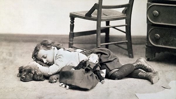 CHILD WITH DOLL, c1895. American photograph
