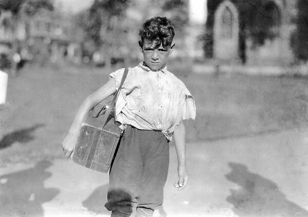 CHILD LABOR: BOOTBLACK, 1924. Young bootblack in New Haven, Connecticut. Photograph by Lewis Hine