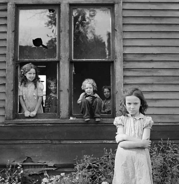 CHILDREN, c1940. Children playing in an abandoned house. Photograph, 1940