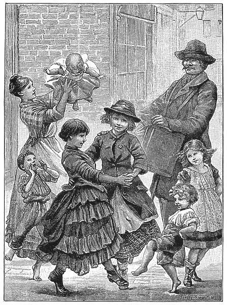 CHILDREN DANCING. Children dancing in the street to the tunes of an organ grinder. Wood engraving after a painting of 1886 by Dorothy Tennant