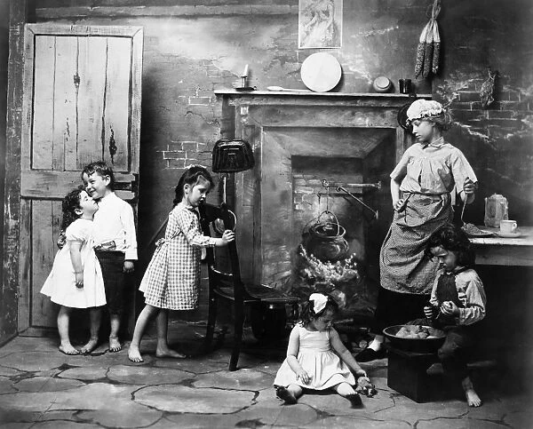 CHILDREN PLAYING, 1902. Staged photograph, American, 1902, by Fritz W. Guerin