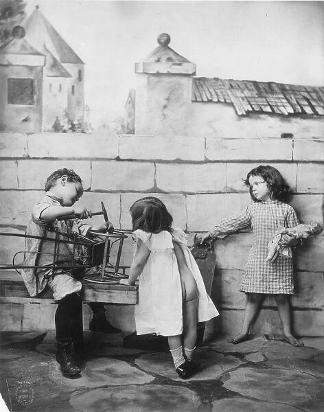 CHILDREN PLAYING, c1900. American photograph, c1900, by Fritz W. Guerin, St. Louis