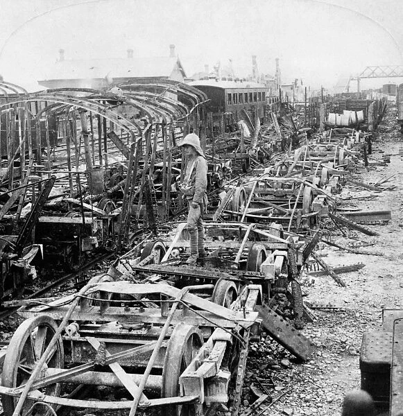 CHINA: BOXER REBELLION. Railroad cars destroyed by fire at the station during the