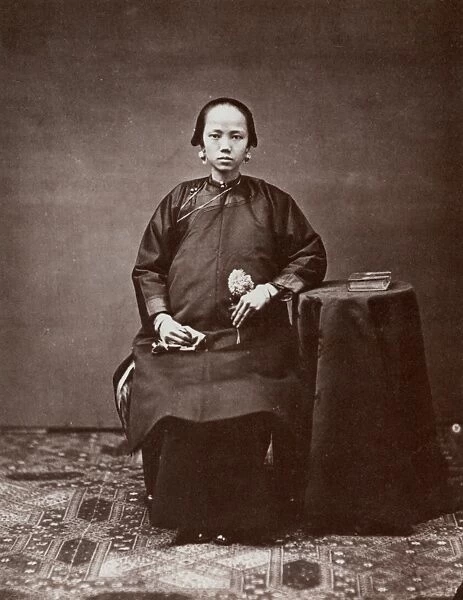CHINA: MOTHER, 1860s. A pregnant girl in Macao. Photographed by M. Miller, 1861-64