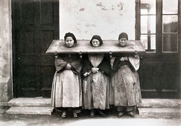CHINA: PUNISHMENT, 1907. Three women in the cangue, or collar of wood, as punishment, Shanghai, 1907