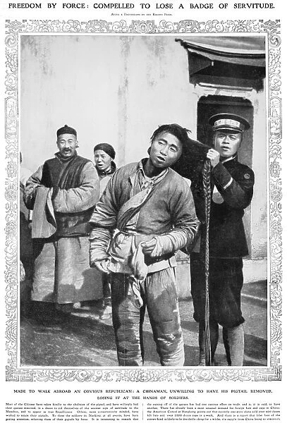 CHINA: REVOLUTION, 1912. A revolutionary soldier cuts the hair of a man, unwilling to give up his pigtail during the Xinhai Revolution. Photograph from an English newspaper of 1912