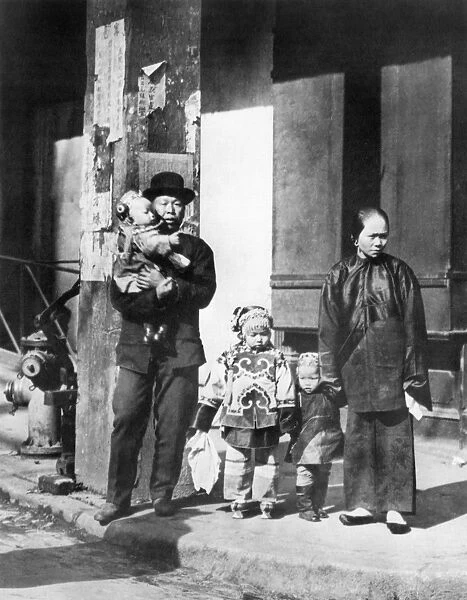 CHINESE IMMIGRANTS. A family outing in San Franciscos Chinatown: photographed, c