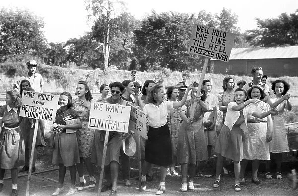 CIO PICKETERS, 1941. Congress of Industrial Workers (CIO) picketers jeering at workers entering a mill in Greensboro, Greene County, Georgia. Photograph by Jack Delano, May 1941