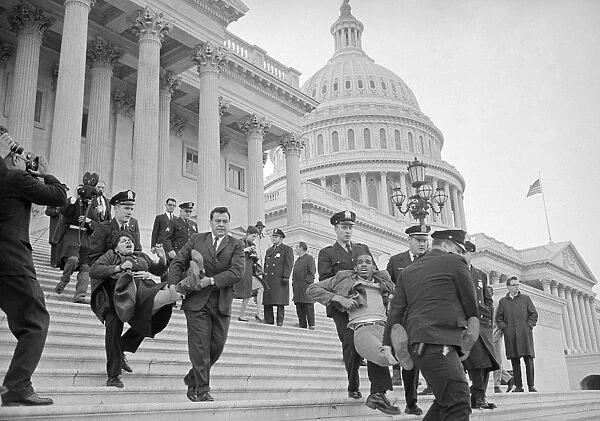 CIVIL RIGHTS PROTEST, 1965. Police removing civil rights activists from their sit-in