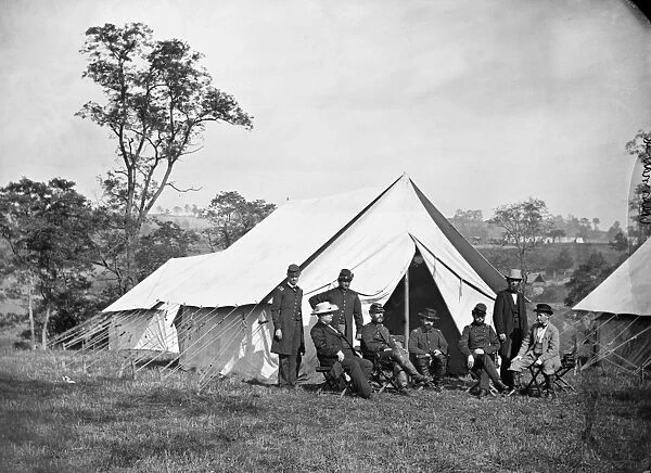CIVIL WAR: ANTIETAM, 1862. The Army of the Potomac headquarters: Captain Rives;John Garrett, President, B & O Railroad;an orderly;General Randolph Marcy;Lieutenant Colonel Andrew Porter;Commissary of Subsistence;Colonel Thomas Mather;Ozias Hatch, Secretary of State of Illinois;Joseph C. G. Kennedy. Photograph by Alexander Gardner, 3 October, 1862