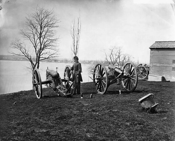 CIVIL WAR ARSENAL, 1862. General Daniel Sickles with two Wiard guns at the arsenal at Washington, D. C. 1862. Photographed by Mathew Brady