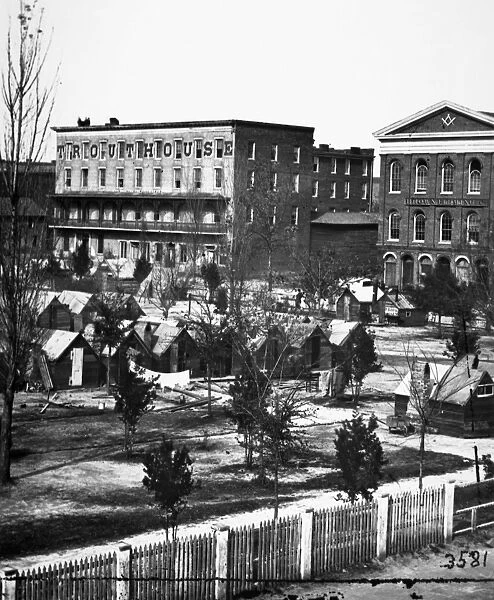 CIVIL WAR: ATLANTA, 1864. Trout House, Masonic Hall, and Federal encampment on Decatur Street, Atlanta, Georgia, 1864. Photograph by George N. Barnard