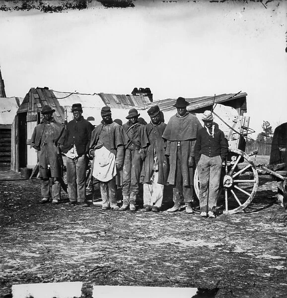 CIVIL WAR: BLACK TROOPS. Black teamsters near the signal tower at Bermuda Hundred, Virginia, 1864