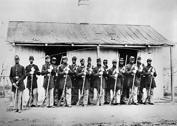 CIVIL WAR: BLACK TROOPS. Guard House and African American guards of the 107th U. S. Colored Infantry Regiment at Fort Corcoran, Arlington, Virginia, during the American Civil War