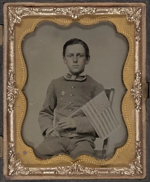 CIVIL WAR: BOY, c1863. Portrait of a boy holding a 34-star flag. Ambrotype, c1863
