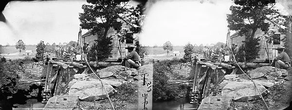 CIVIL WAR: BRIDGE BUILDING. Troops constructing a bridge across the North fork