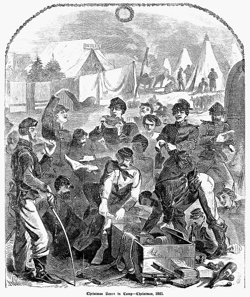 CIVIL WAR: CHRISTMAS, 1861. Union soldiers opening boxes in camp on Christmas 1861. Wood engraving, after Winslow Homer, on the front page of Harpers Weekly, 4 January 1862