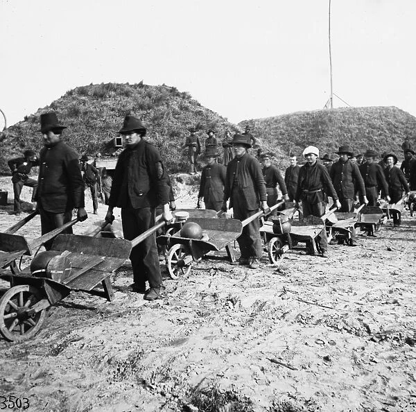 CIVIL WAR: GEORGIA, 1864. General William Tecumseh Shermans troops removing ammunition in wheelbarrows from Fort McAllister, near Savannah, Georgia, December 1864