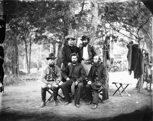 CIVIL WAR: IRISH BRIGADE. Father William Corby (seated right) and other chaplins of the 69th New York Infantry (Irish Brigade) at Harrisons Landing, Virginia, July 1862. Photographed by Mathew Brady